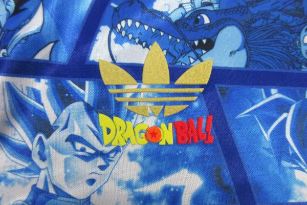 21721c88-scaled-1.jpg Camiseta Japón Azul – Versión Dragon Ball Pro Player