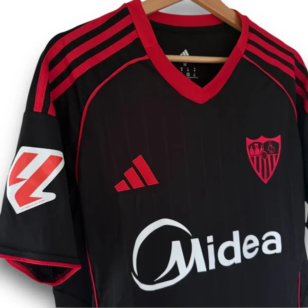 IMG-3631.webp Camiseta Sevilla 2025-2026 Alternativa
