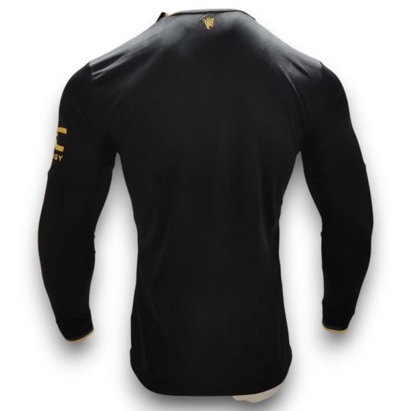 b04c60c3-Photoroom.jpg Camiseta Manchester United 2025-2026 Alternativa Manga Larga – Version Pro Player