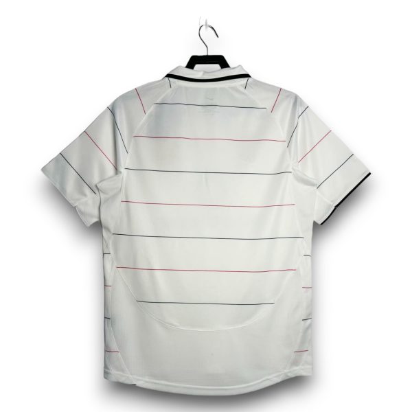 c64e6bbc.jpg Camiseta Manchester United 2003-2006 Alternativa