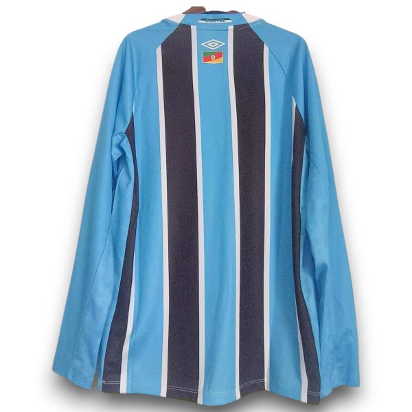 camiseta-gremio-25-26-home-manga-larga-Photoroom.jpg Camiseta Gremio 2026 Local Manga Larga