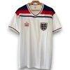 camiseta-inglaterra-82-local-Photoroom.jpg Camiseta Inglaterra 1982 – Local