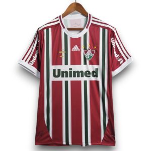 camiseta-retro-local-roja-verde-fluminense-2012-adidas-1-f41d8681f6309638b517290836944304-1024-1024-Photoroom.jpg Camiseta Fluminense 2012-2013 Local