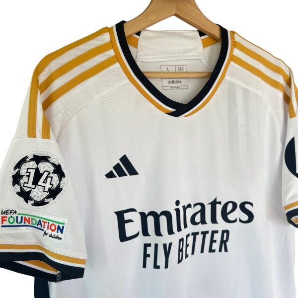 comprar-camiseta-real-madrid-local-2023-2024-la-liga-bellingham-vinicius-.jpg Camiseta Real Madrid 2023-2024 Local
