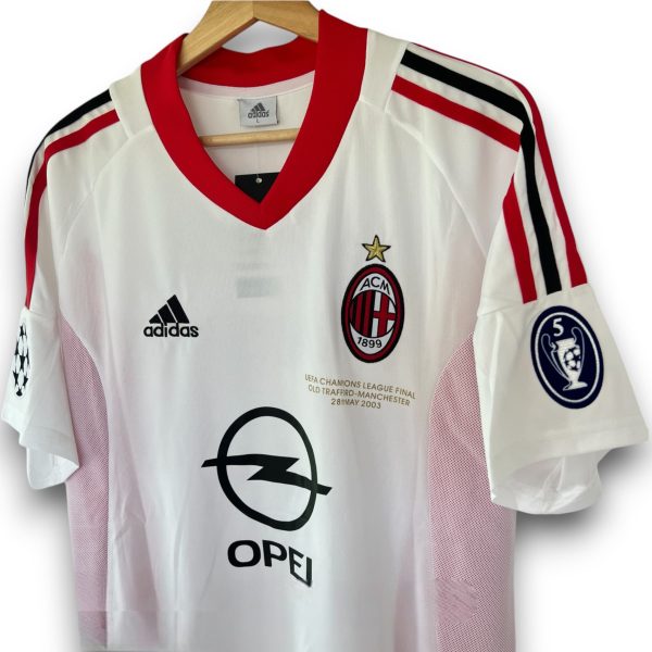 image_09ee9c6b-e904-4221-9e2b-9c9887e4e56a-Photoroom.jpg Camiseta AC Milán 2002-2003 Visitante Final UCL