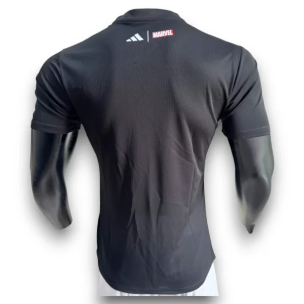 real-madrid-25-26-marbel-pro-player1.webp Camiseta Real Madrid x Marvel 2025-2026 – Version Pro Player