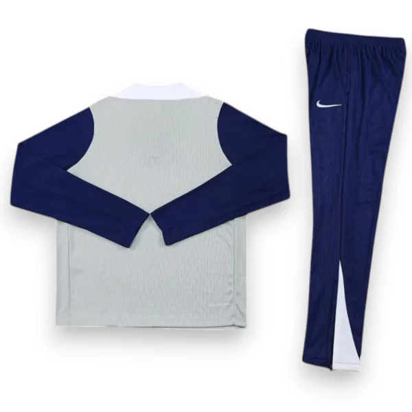 tottenham-25-26-grey-with-dark-blue-training-suit-kid-size-1.webp Chándal Tottenham 2025-2026 Grey – Entrenamiento